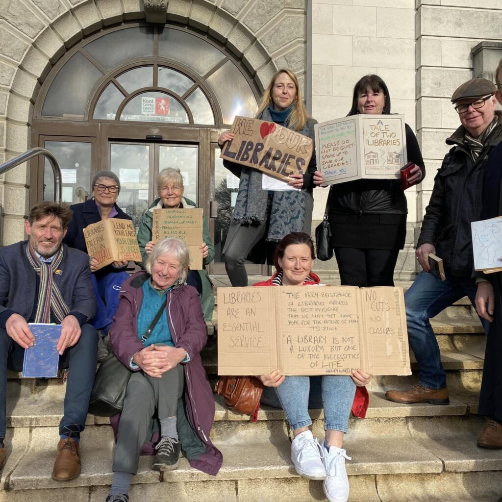 Photo of a group of people protesting against library closures