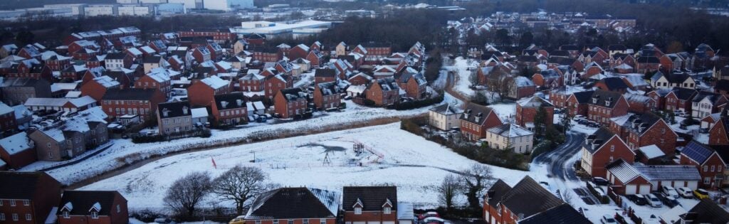 Photo of houses in the snow from above